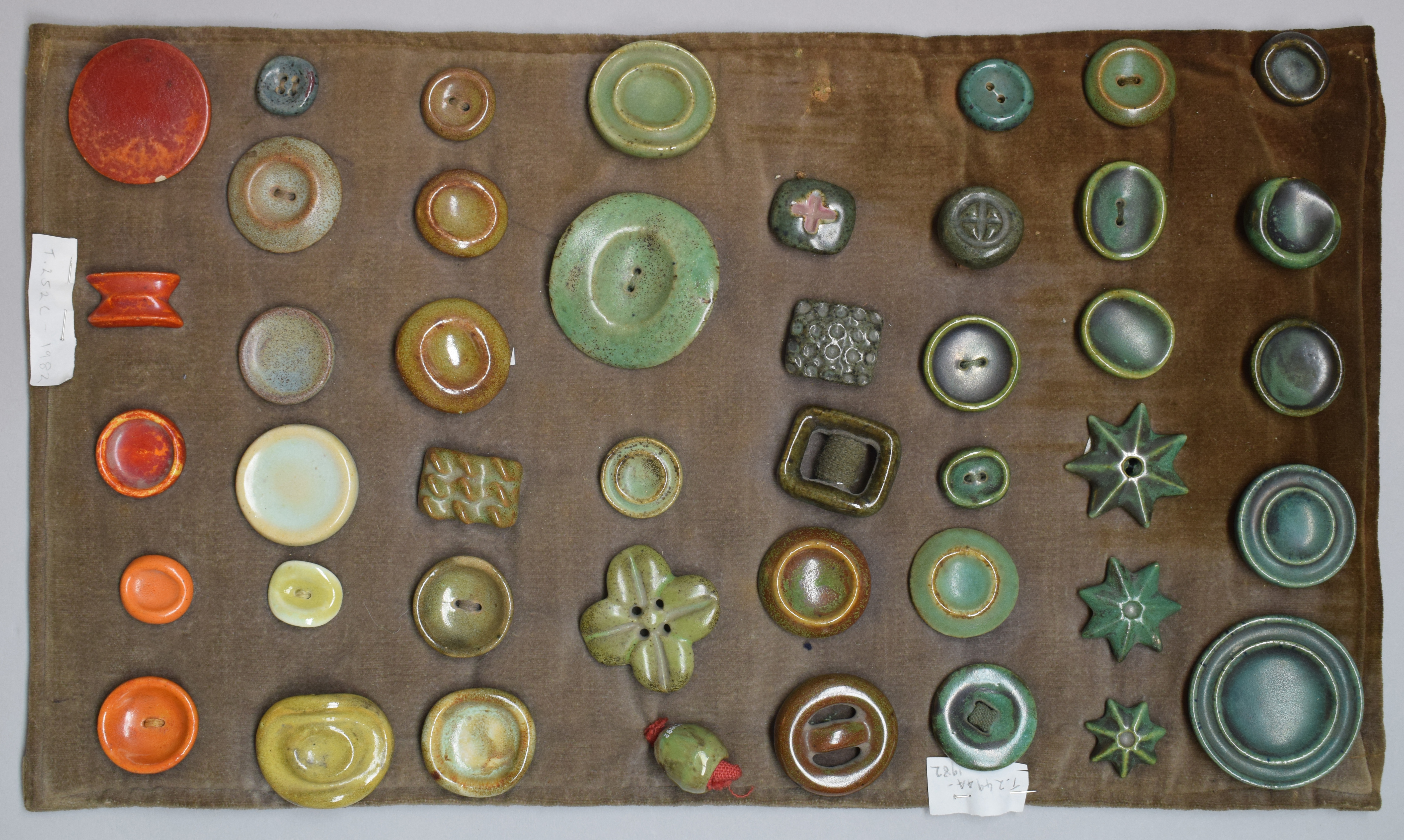 Collection of ceramic buttons designed and made by Lucie Rie.