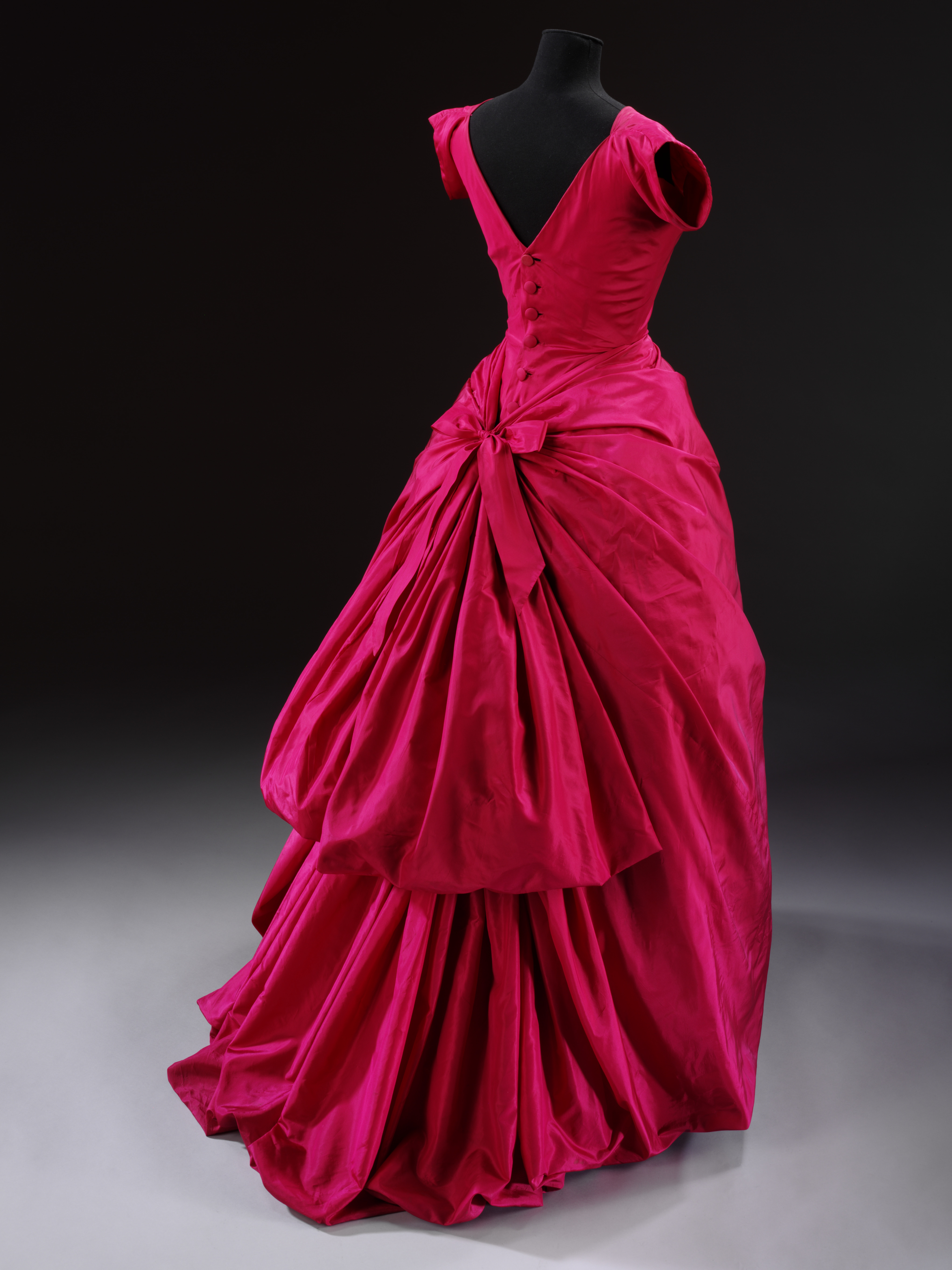 Pink silk taffeta evening dress, circa 1955.