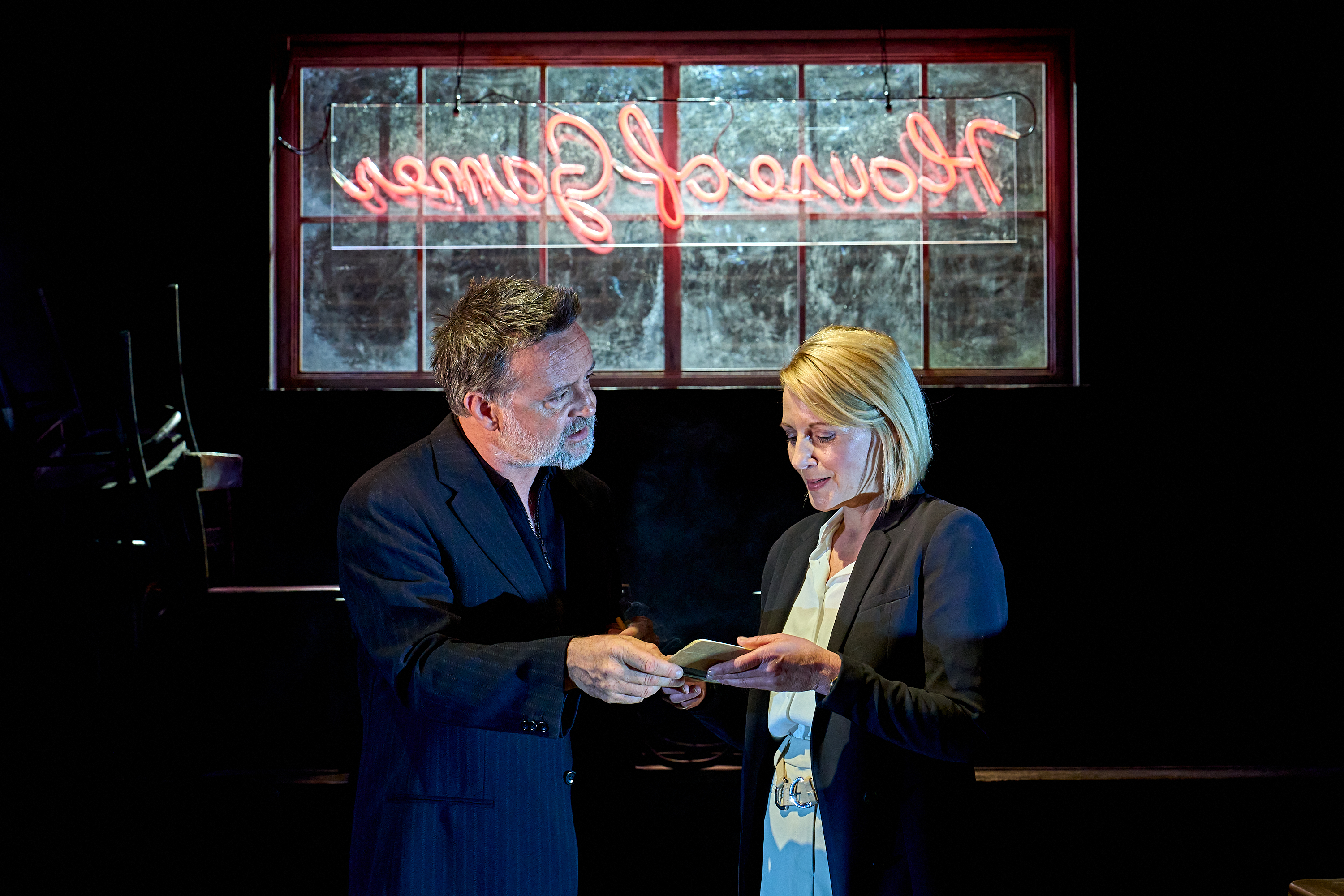 Richard Harrington and Lisa Dillon in a scene from the play *House of Games*.
