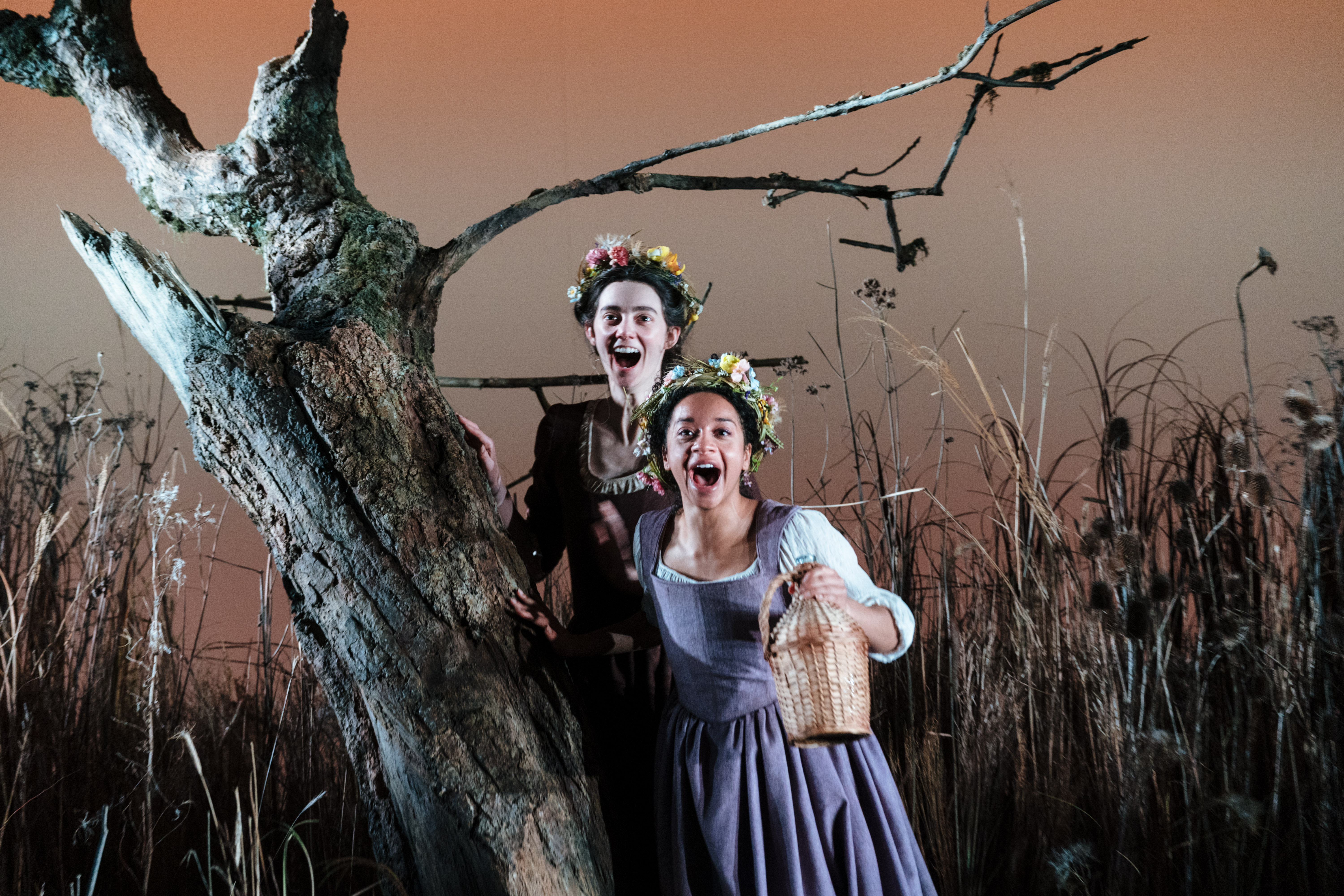 Tanya Reynolds and Siena Kelly in a theatrical production.